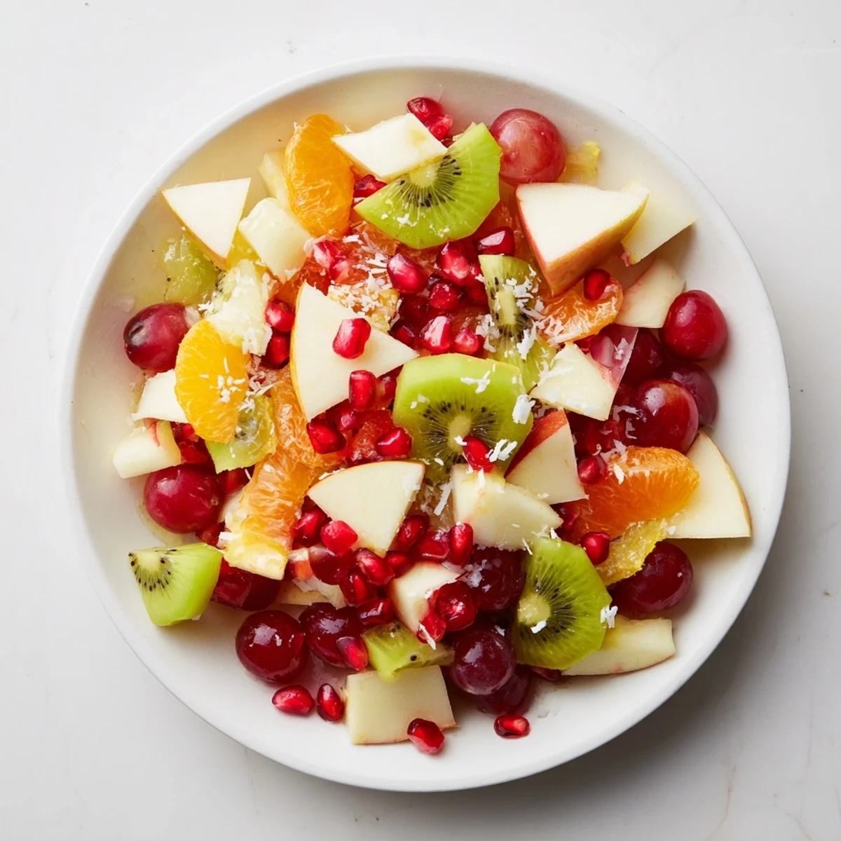 Close-up of a Snowflake Fruit Medley showcasing fresh fruit segments and a light citrus glaze.