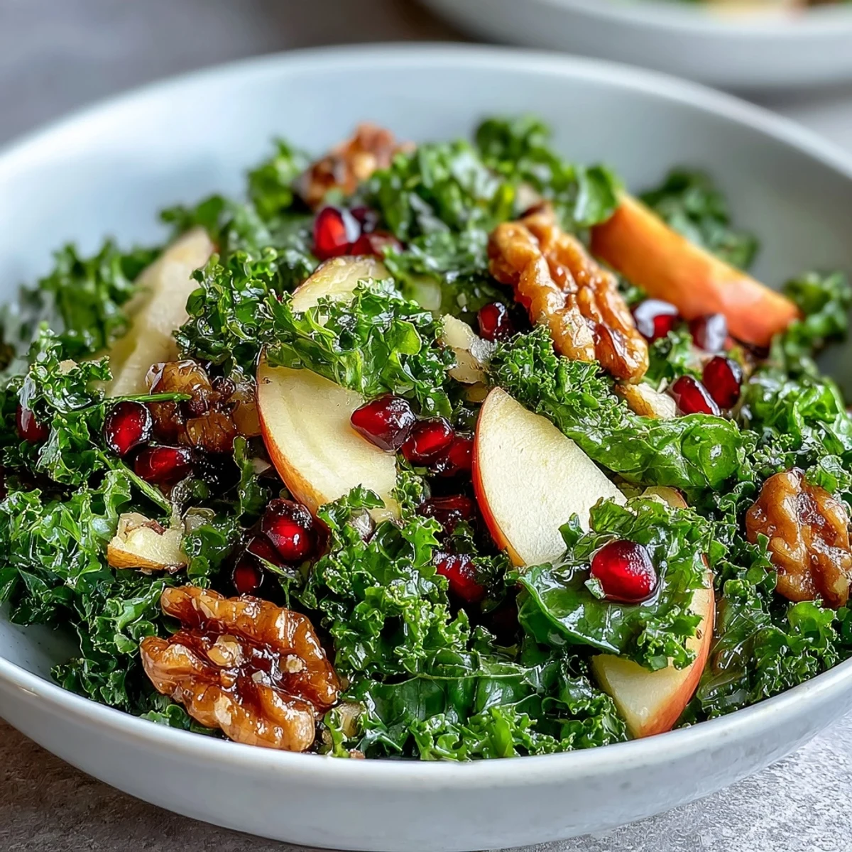 Fresh Kale and Pomegranate Bowl served in a white bowl, perfect for a quick lunch or dinner.