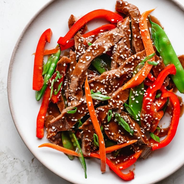 Aromatic Sweet Teriyaki Pork Stir-Fry, showcasing savory pork and crisp veggies, ideal for a quick dinner.